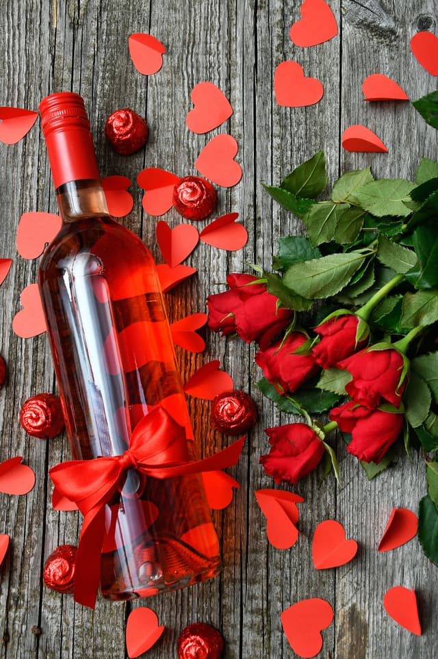 https://cloud.markethubtz.com/StorePics/64b769f04114701804905d32/valentine-wine.jpg